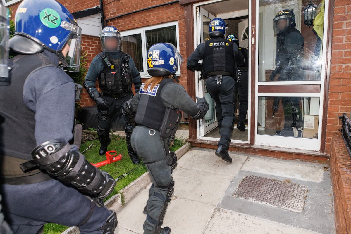 The arrest of nine individuals during a series of well-coordinated raids