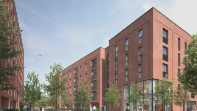 CGI image of what the apartments will look like once compelted. Contemporary red brick low rise apartments
