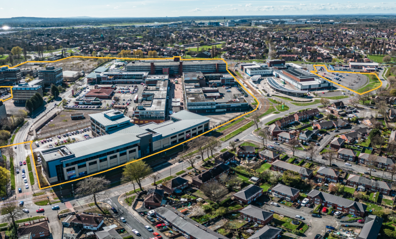 aerial image of Wythenshawe civic with a yellow line around the development area