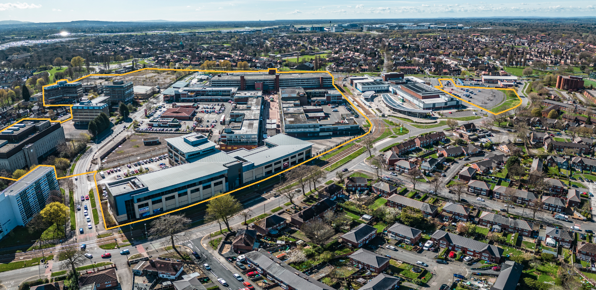 aerial image of Wythenshawe civic with a yellow line around the development area