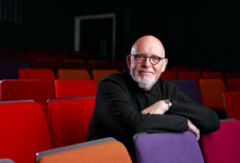 Dave Moutrey sat in theatre seats