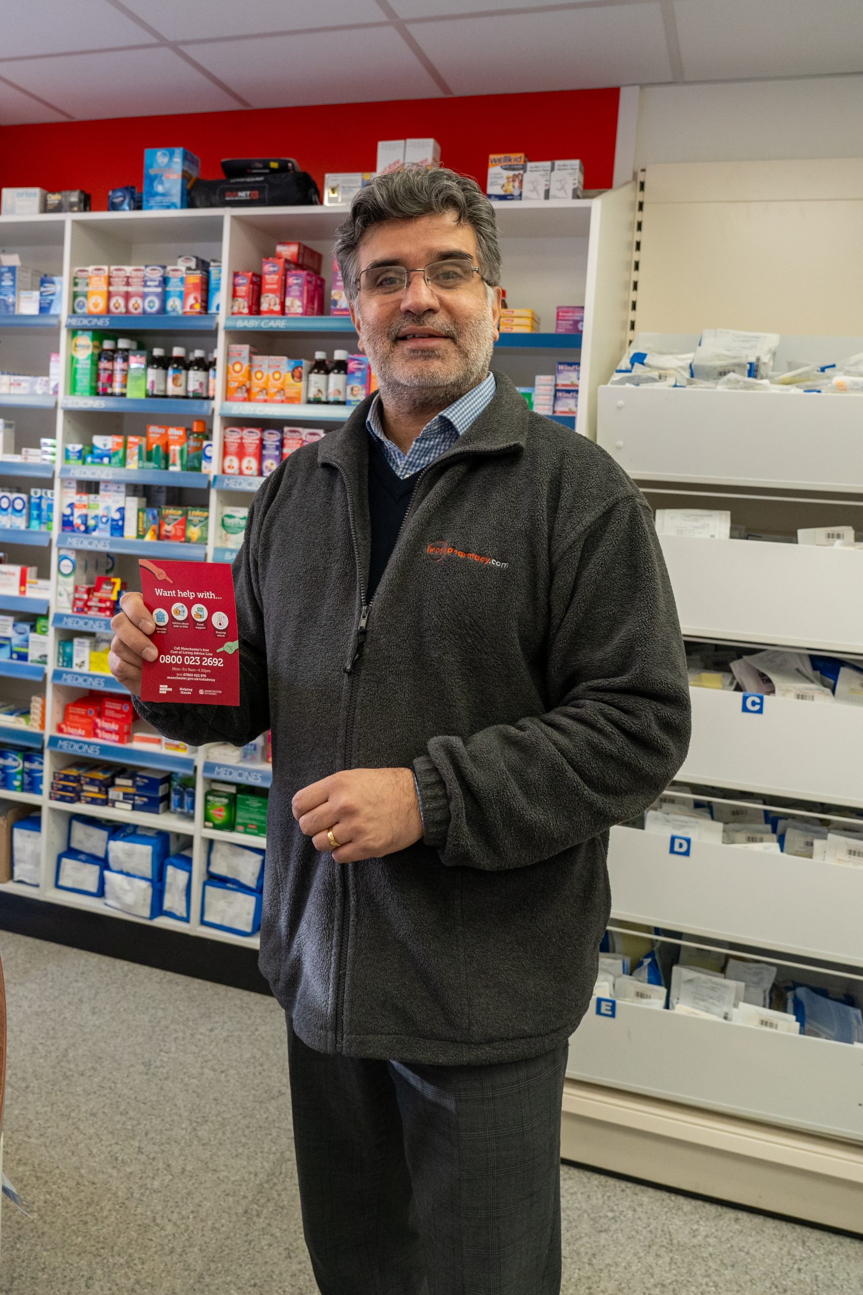Maneet Kapoor standing in his pharmacy