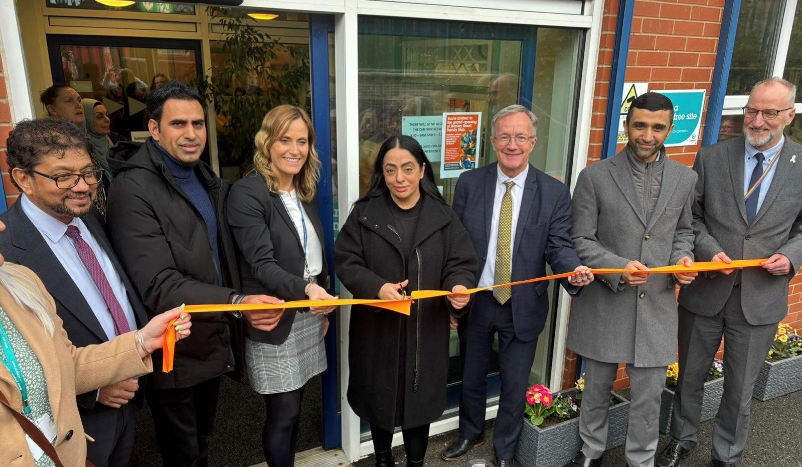 The Council Leader Arooj Shah cutting the ribbon at the opening of Stanley Road Family Hub