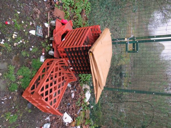 Broken trays dumped on the ground