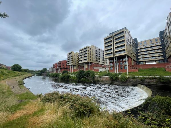 River Irwell with apartments in the background