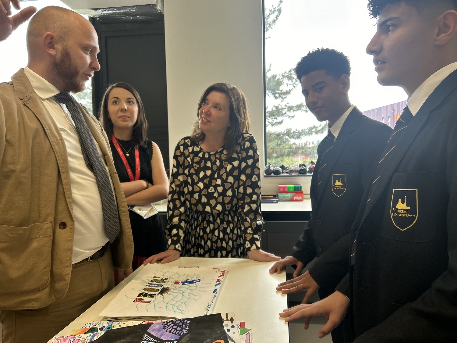 Dame Rachel smiling as she she met pupils and staff