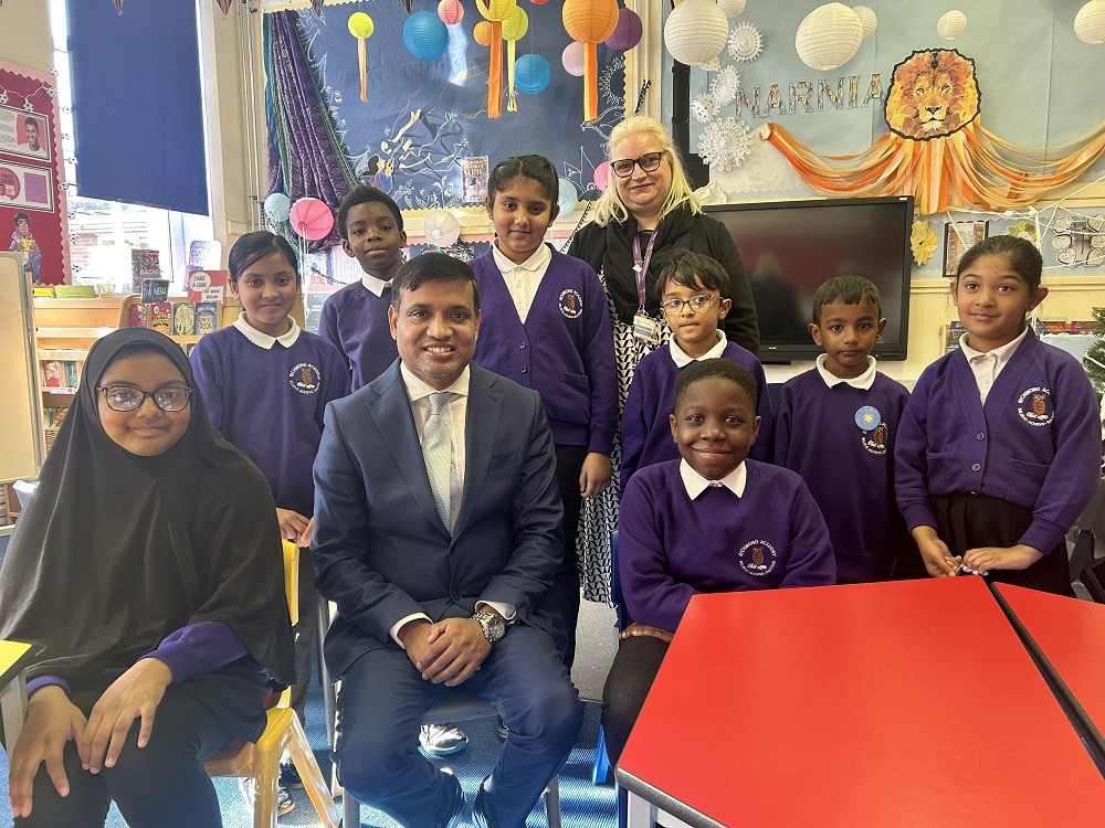 Cllr Mohon Ali with the Children's Leadership Team and headteacher Claire Rahman