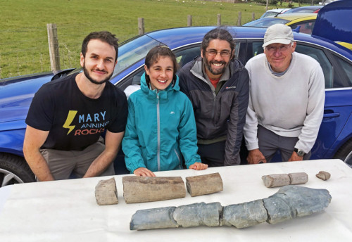 Part of the research team in 2020 examining the initial finds (at the back) of the new discovery made by Ruby and Justin Reynolds. Additional sections of the bone were subsequently discovered. From left to right, Dr Dean Lomax, Ruby Reynolds, Justin Reynolds and Paul de la Salle. Credit: Dr Dean Lomax