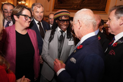 Professor Carly McLachlan and Nile Rodgers meets King Charles at the International Sustainability Reception at Buckingham Palace