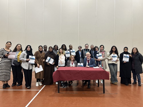 Oldham residents with their certificates after competing the Step into the NHS course