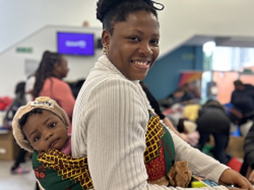 A smiling mum and baby at last year's event 