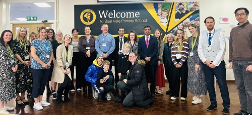 Guests including Cllr Mohon Ali Cabinet Member for Education and Skills smiling at the Beal Vale ELSEC celebration 